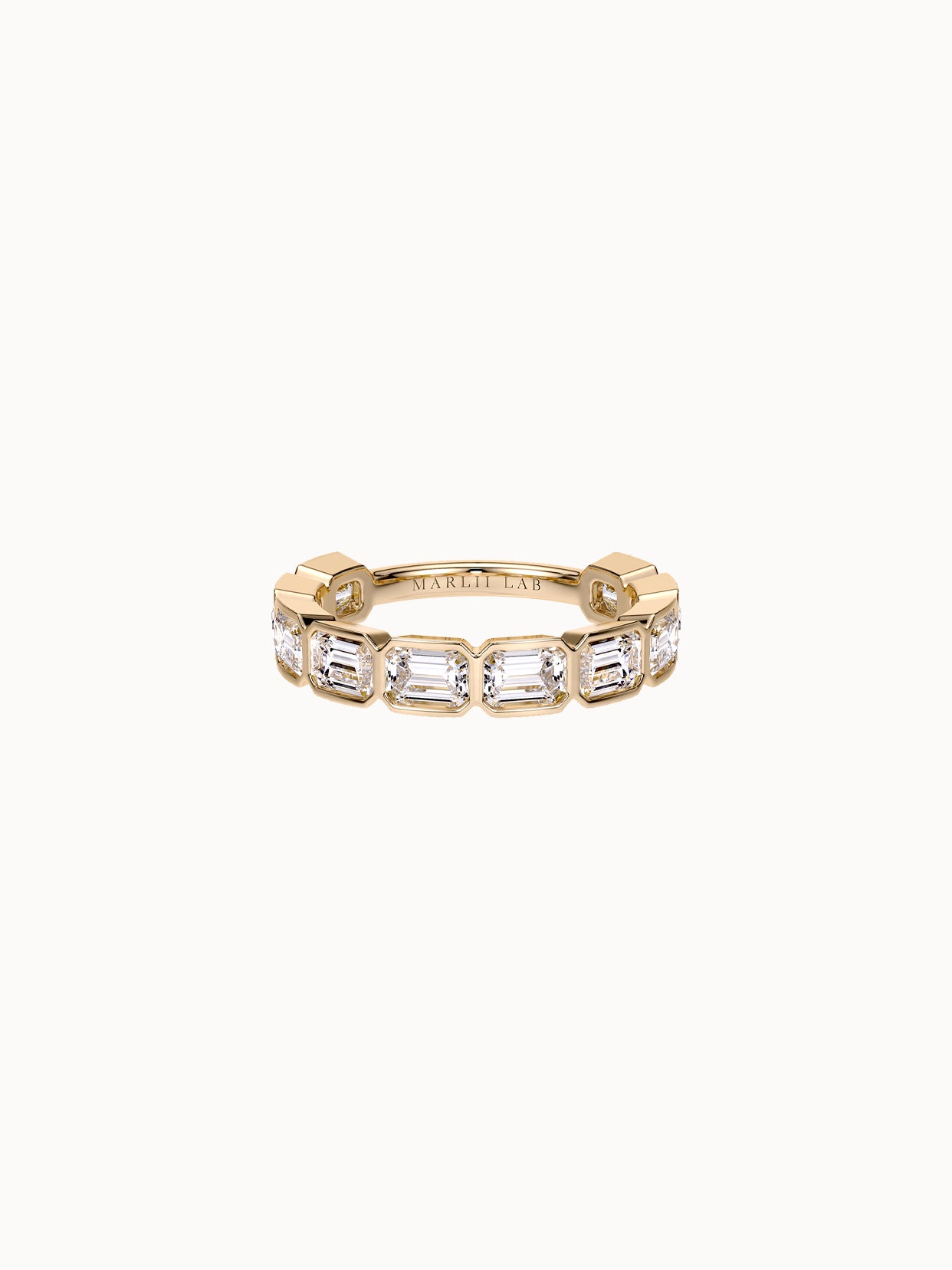 East-West Bezel Emerald Band Grand in 18K yellow gold, emerald cut diamonds bezel set east-west