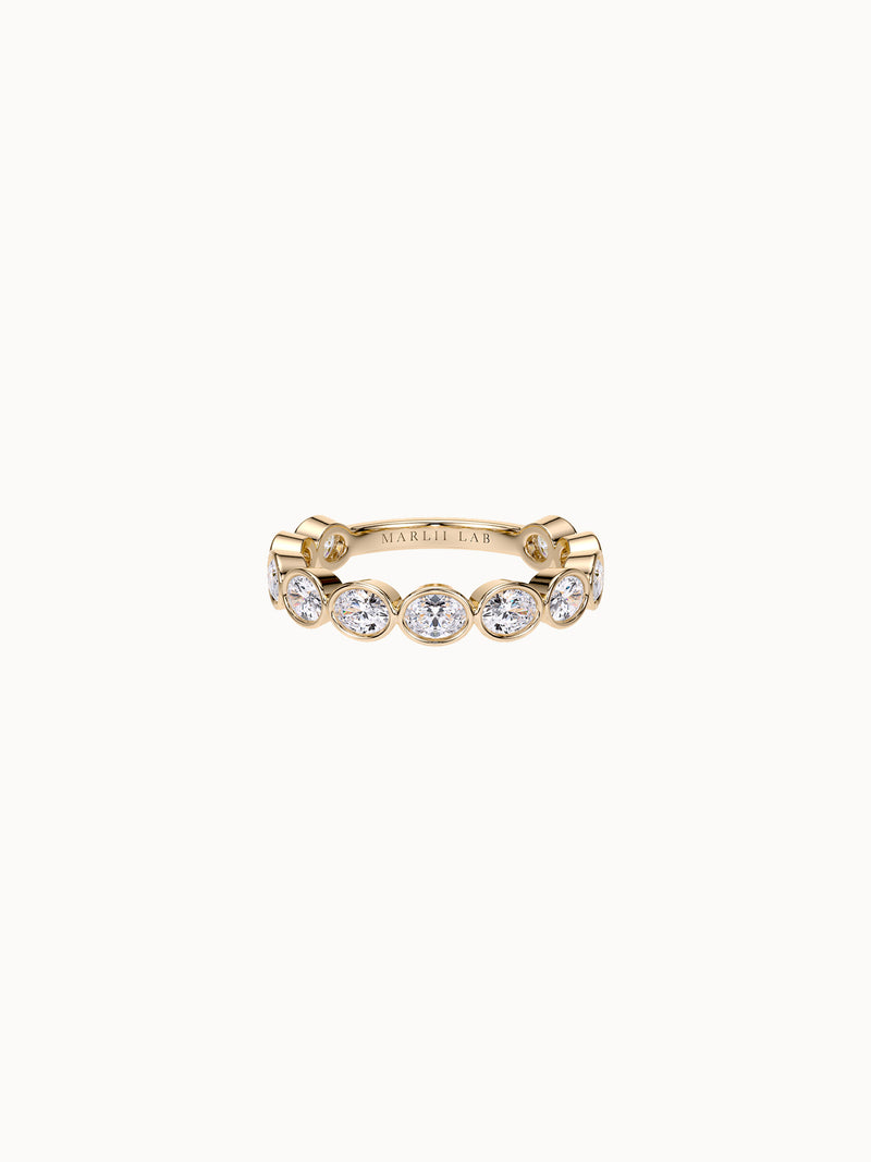 East-West Bezel Oval Band in 18K yellow gold, oval diamonds bezel set east-west