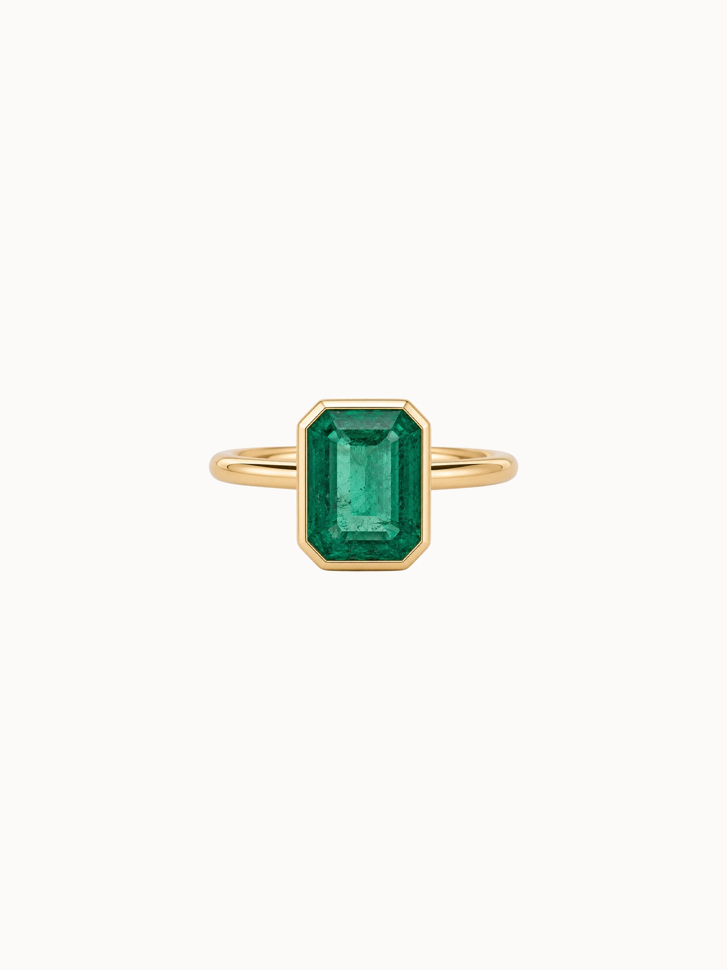 Cutaway Bezel Emerald engagement ring by MARLII LAB — emerald cut centre diamond, bezel setting, 18K Yellow Gold