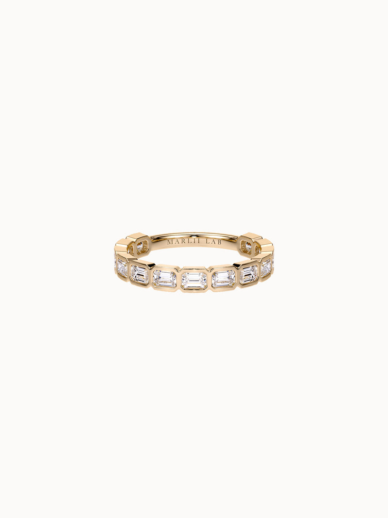 East-West Bezel Emerald Band Petite in 18K yellow gold, emerald cut diamonds bezel set east-west