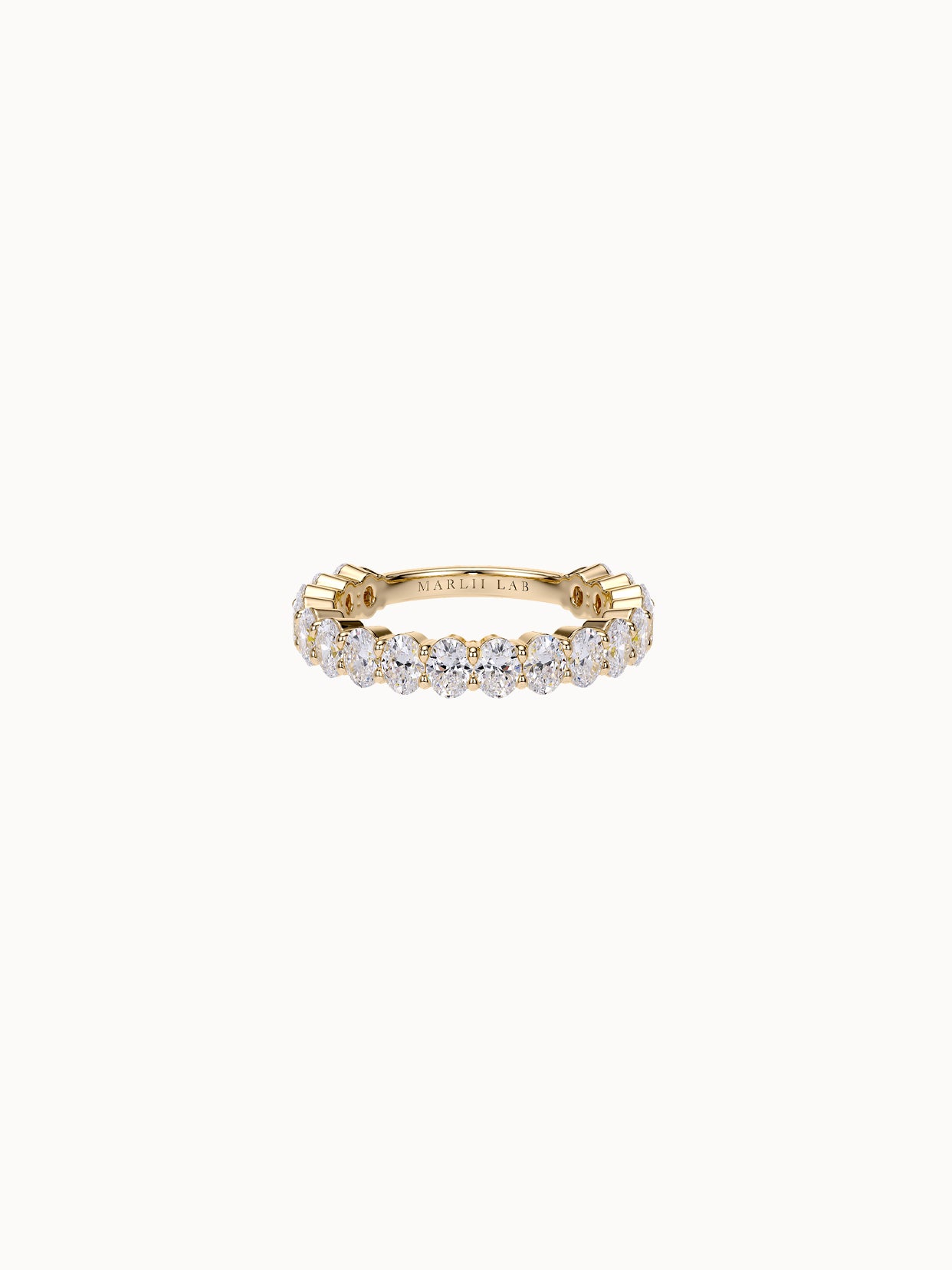 Claw-Set Oval Band Petite in 18K yellow gold, eighteen oval diamonds claw set in a row