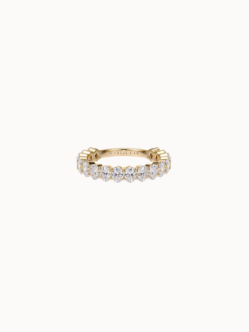 Claw-Set Oval Band Petite in 18K yellow gold, eighteen oval diamonds claw set in a row