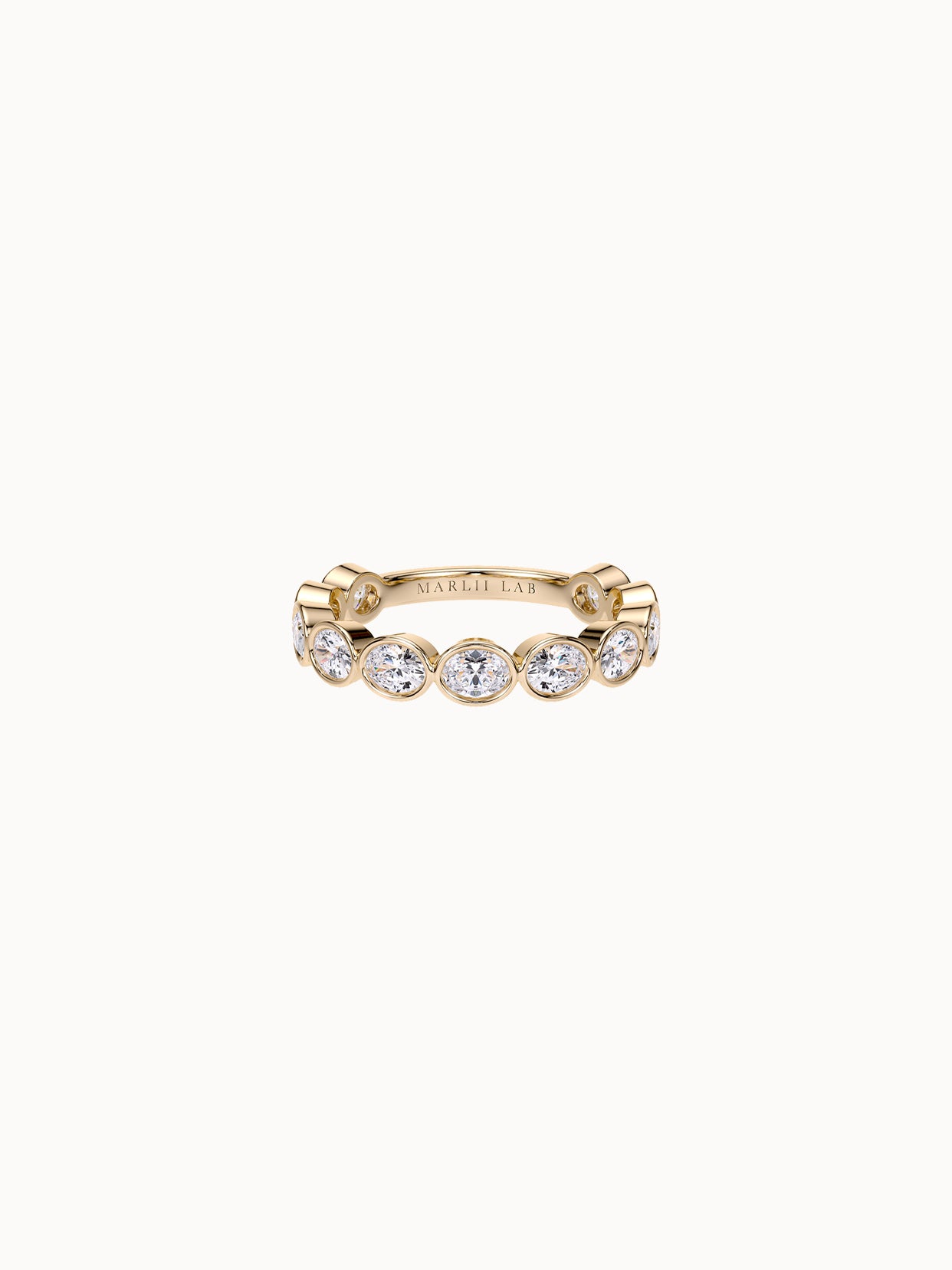 East-West Bezel Oval Band in 18K yellow gold, oval diamonds bezel set east-west