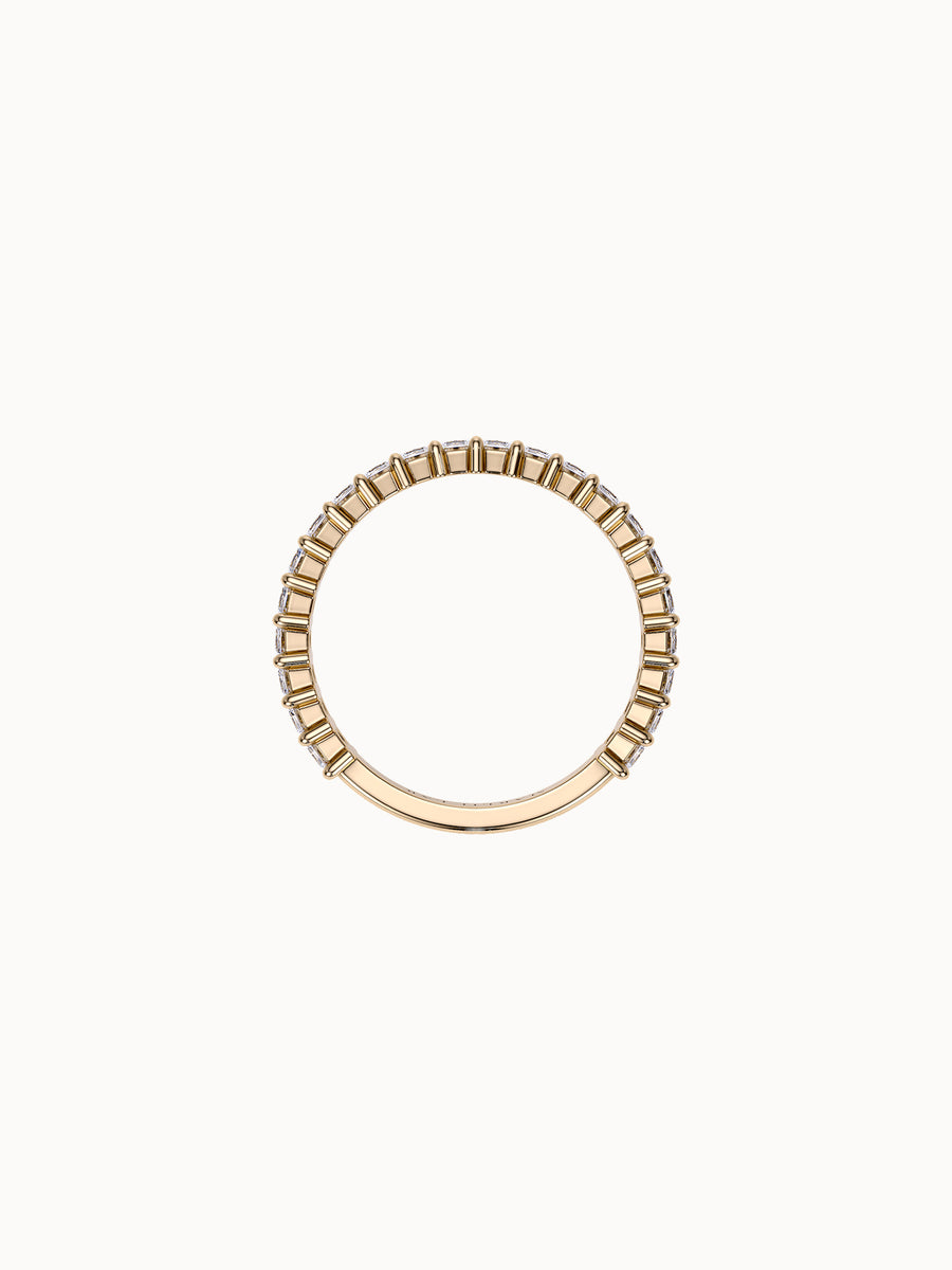 Claw-Set Emerald Band Petite in 18K yellow gold, shown in profile