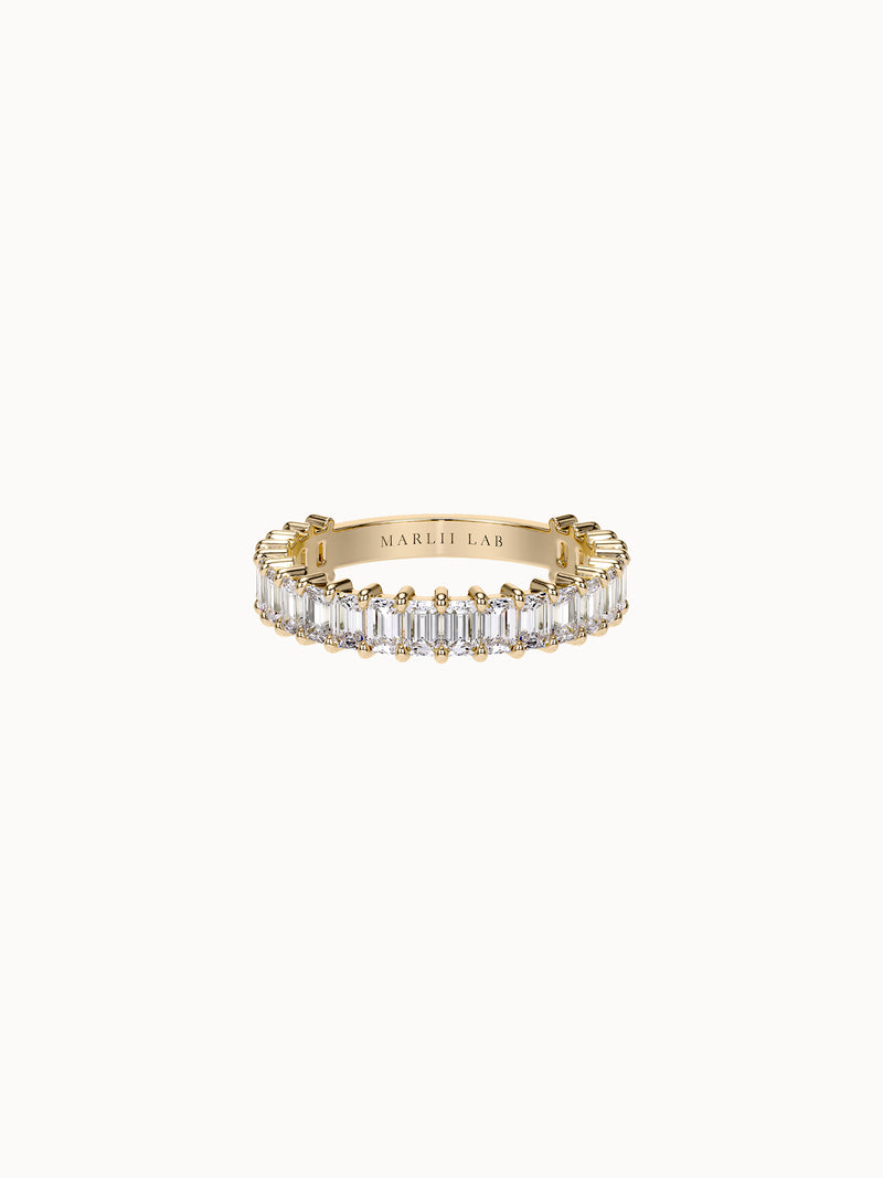Claw-Set Emerald Band Petite in 18K yellow gold, twenty-two emerald cut diamonds claw set in a row