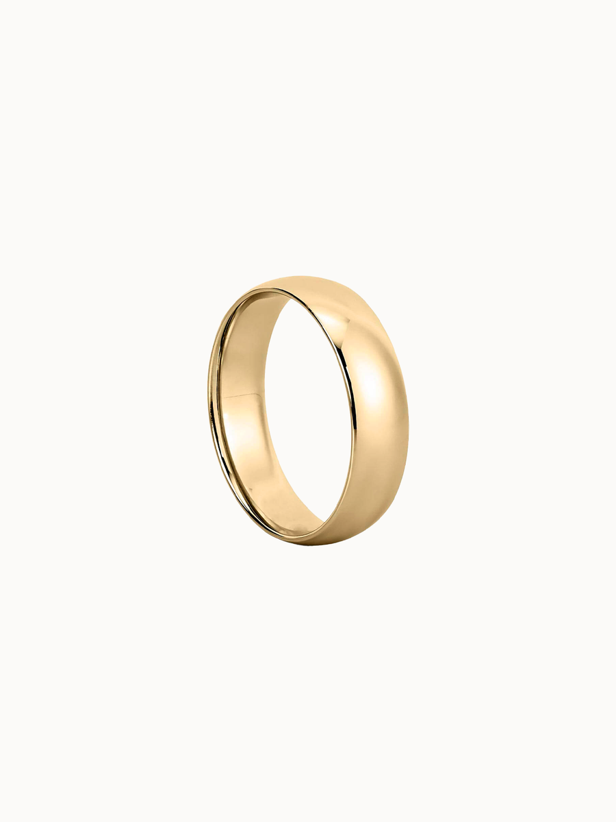 Domed Band wedding ring in 18K yellow gold, shown in profile