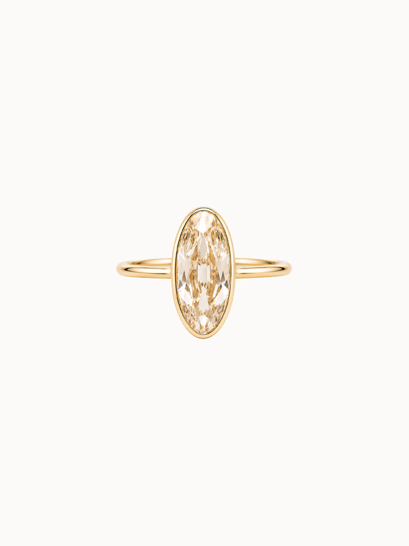 Bezel Champagne Moval engagement ring by MARLII LAB — moval centre diamond, bezel setting, 18K Yellow Gold