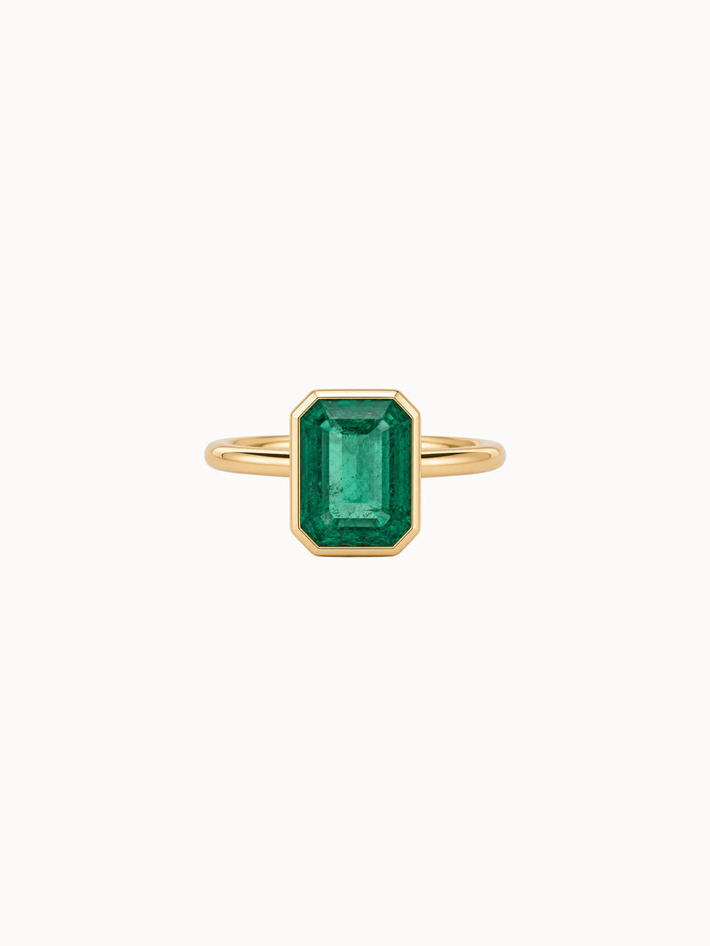 Cutaway Bezel Emerald engagement ring by MARLII LAB — emerald cut centre diamond, bezel setting, 18K Yellow Gold