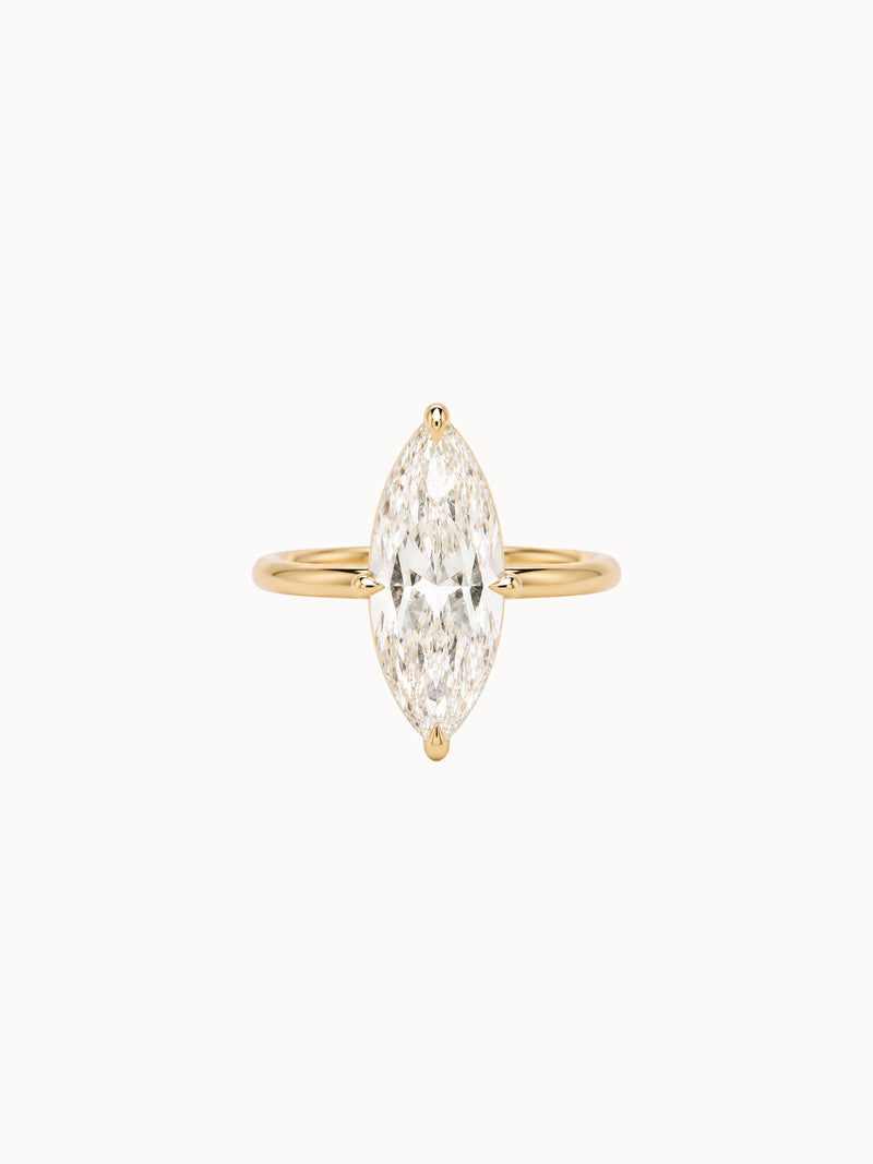 Marquise Cutaway engagement ring by MARLII LAB — marquise centre diamond, four-claw setting, 18K Yellow Gold