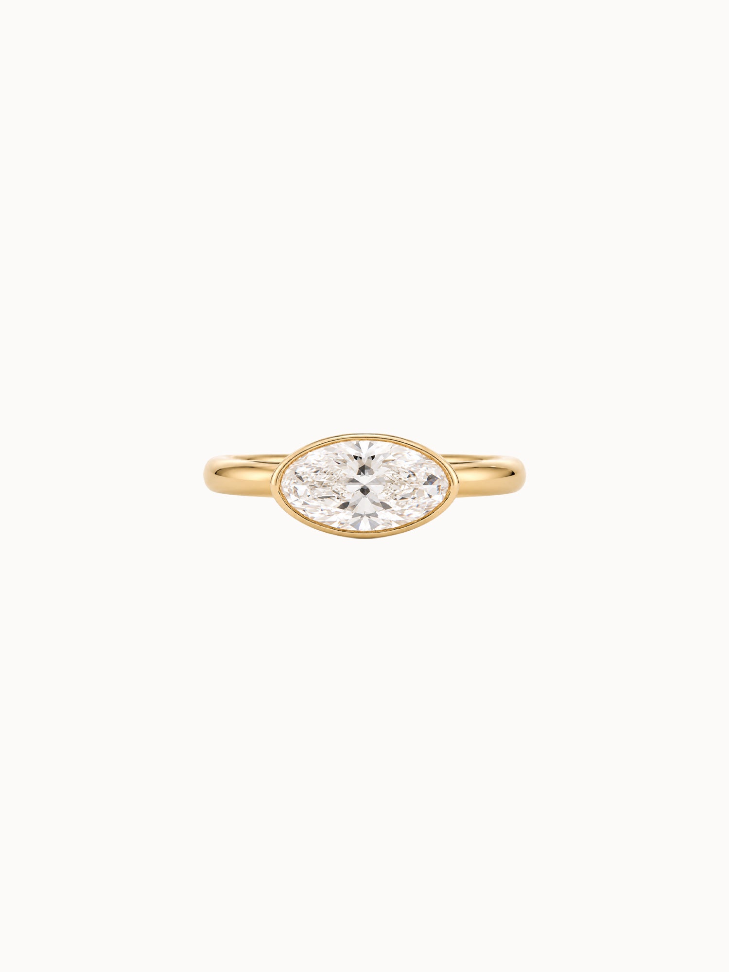 East-West Bezel Oval engagement ring by MARLII LAB — oval centre diamond, bezel setting, 18K Yellow Gold