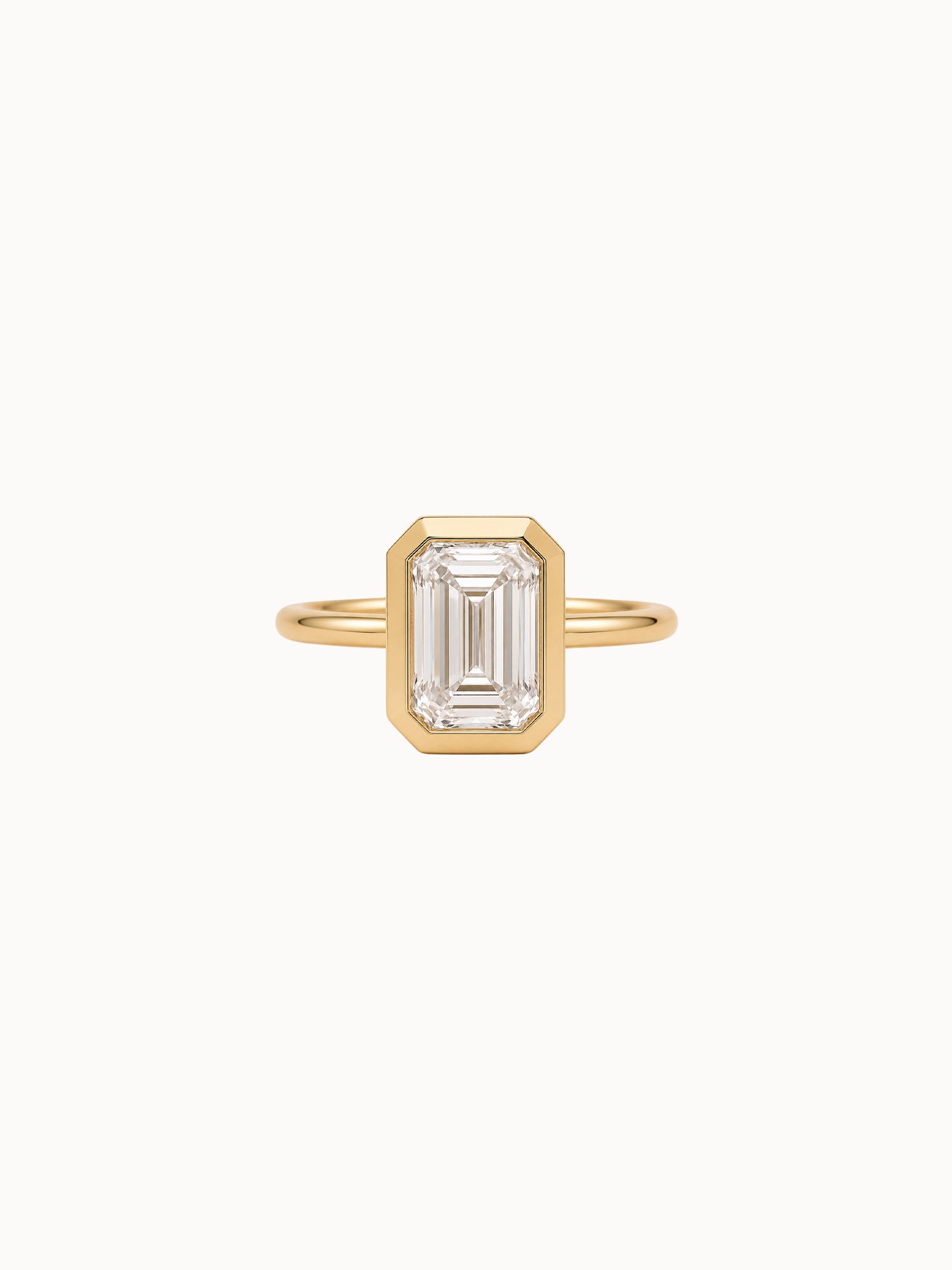 Framed Emerald engagement ring by MARLII LAB — emerald cut centre diamond, bezel setting, 18K Yellow Gold