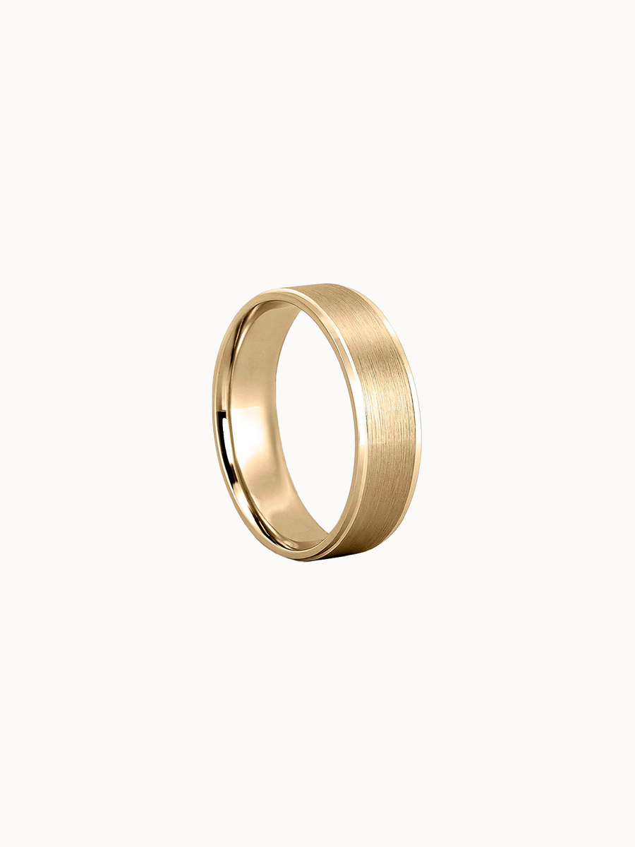 Bevelled Band wedding ring in 18K yellow gold, shown in profile