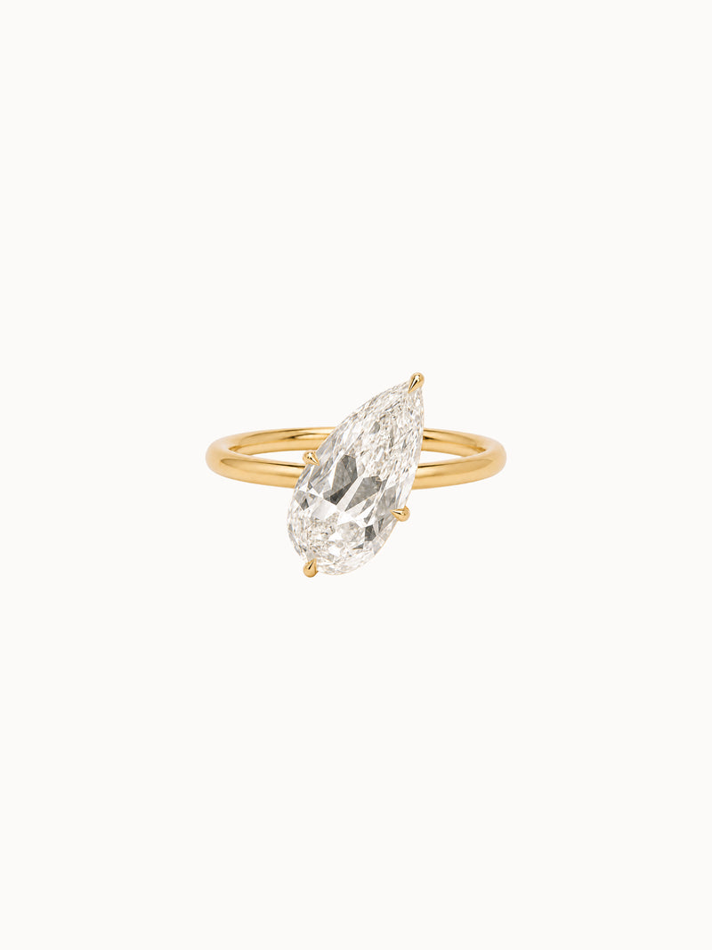 Tilted Old Mine Pear engagement ring by MARLII LAB — pear centre diamond, sculptural setting, 18K Yellow Gold