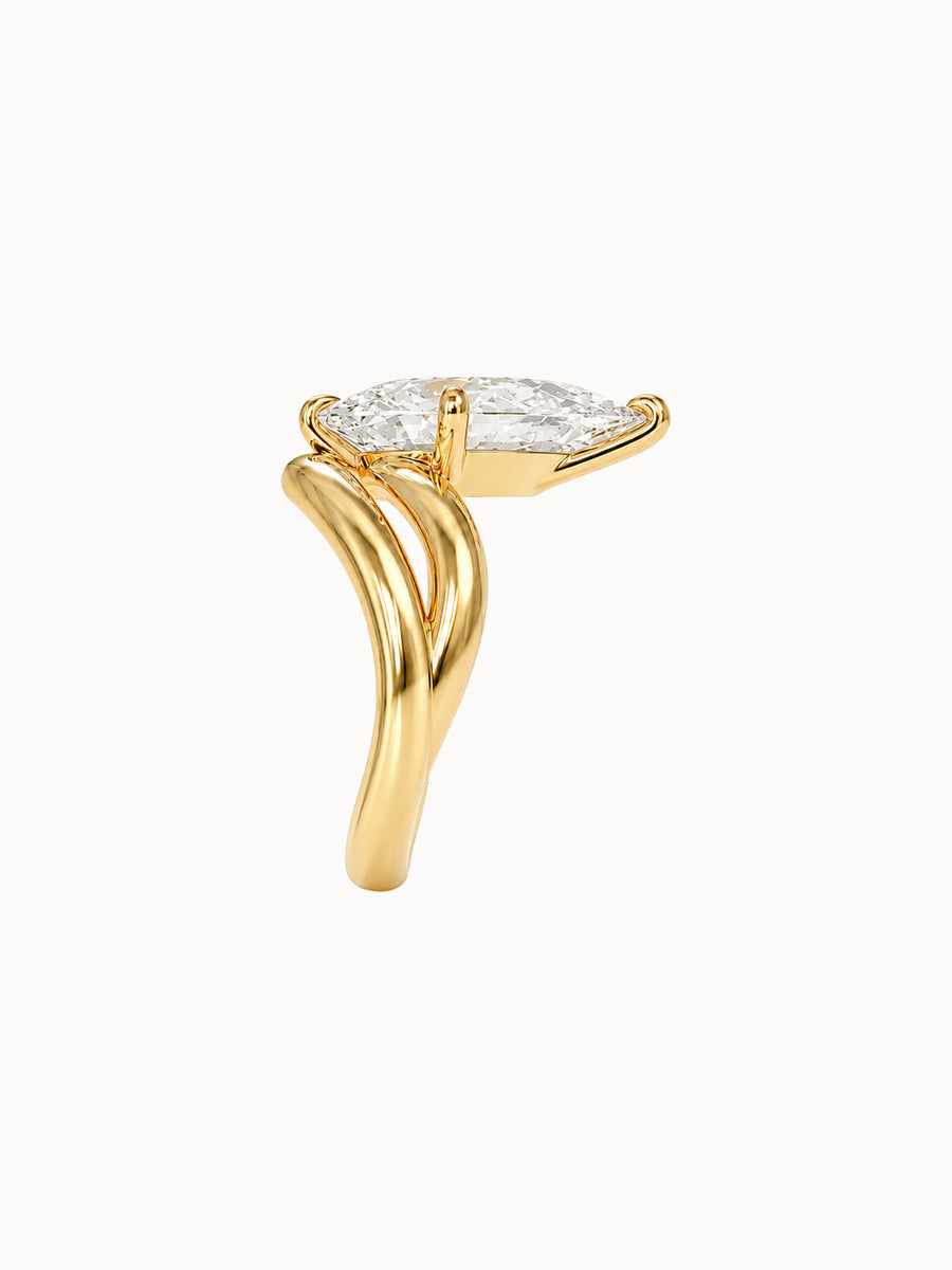 Offset Pear engagement ring by MARLII LAB — pear centre diamond, sculptural setting, 18K Yellow Gold, seen from the side