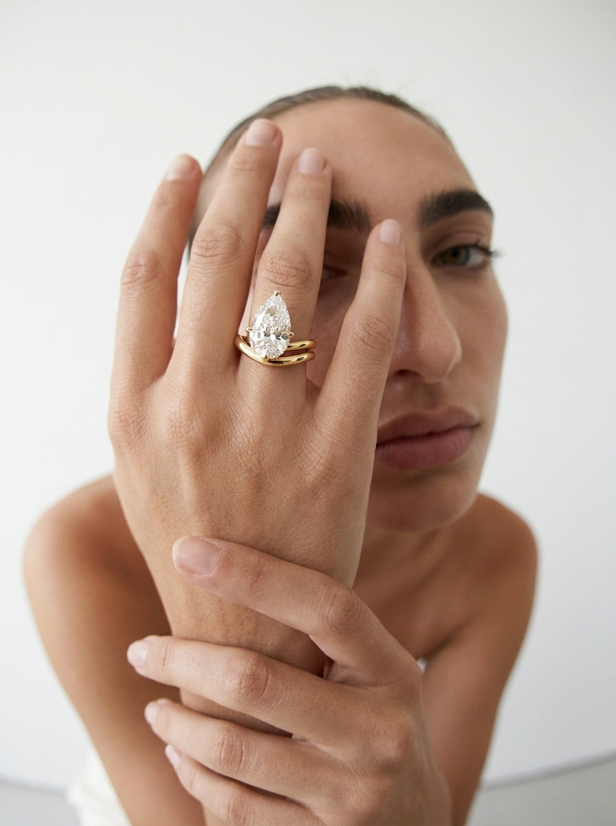 Offset Pear engagement ring by MARLII LAB — pear centre diamond, sculptural setting, 18K Yellow Gold, second view