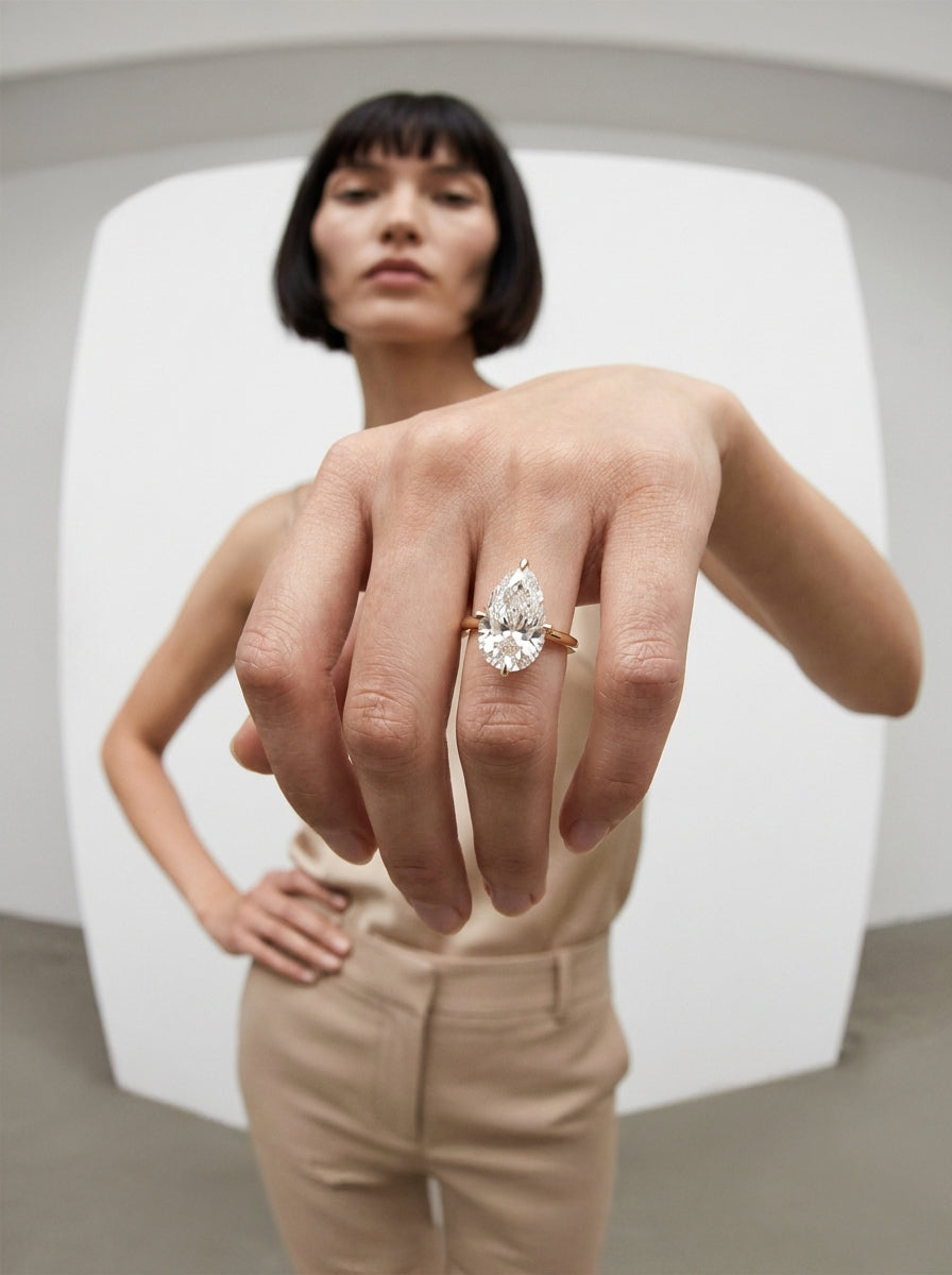 Compass Pear engagement ring by MARLII LAB — pear centre diamond, four-claw setting, 18K Yellow Gold, second view
